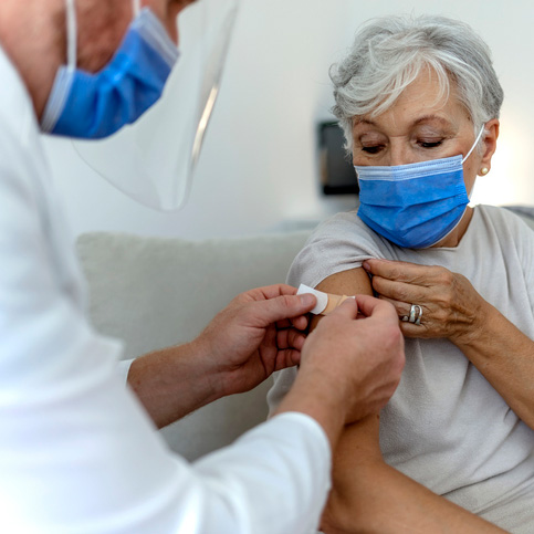 Eldery Woman Getting Vaccine